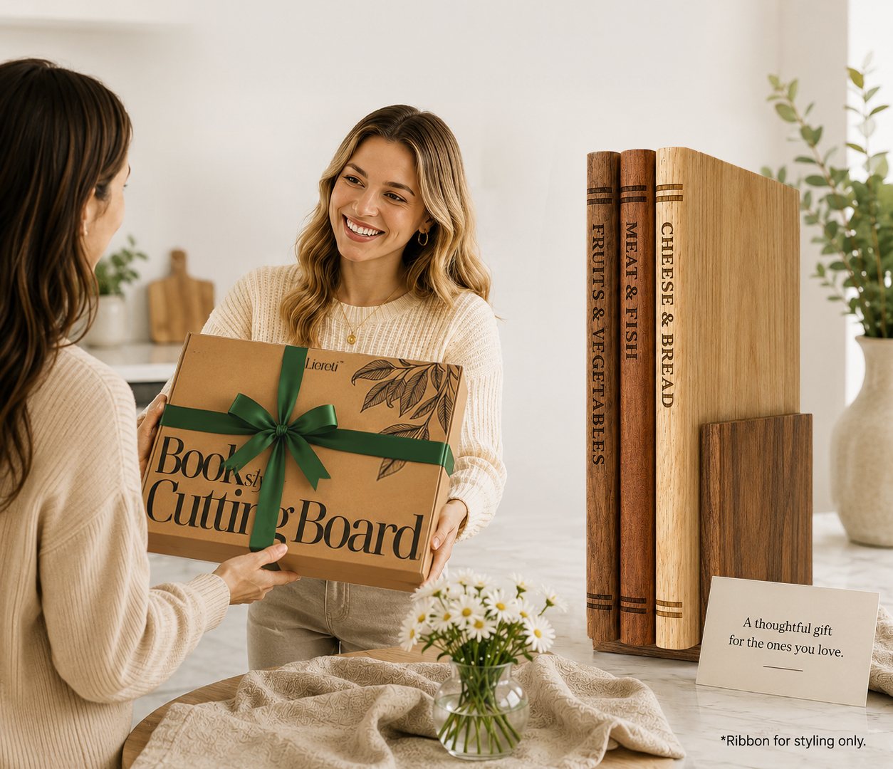 A woman receiving a Liereti book-style cutting board gift box with the wooden set displayed nearby